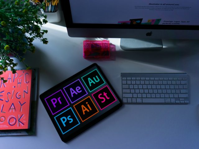 silver imac and apple keyboard