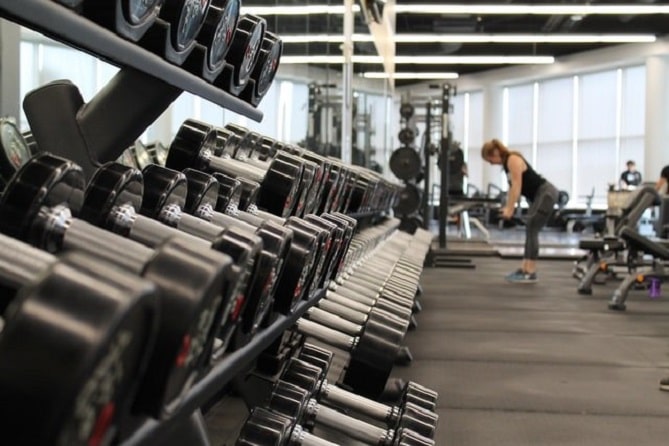 Equipment at the gym and a woman