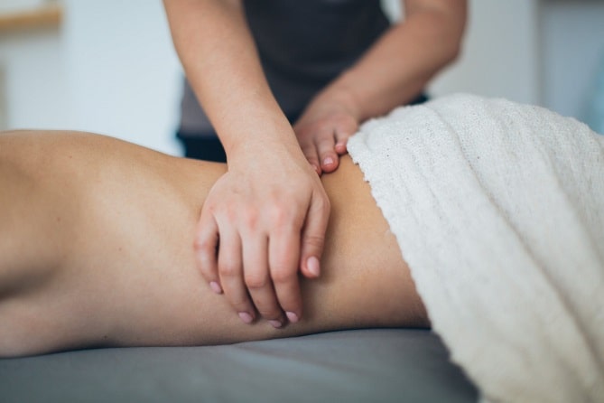 Hands massaging the body