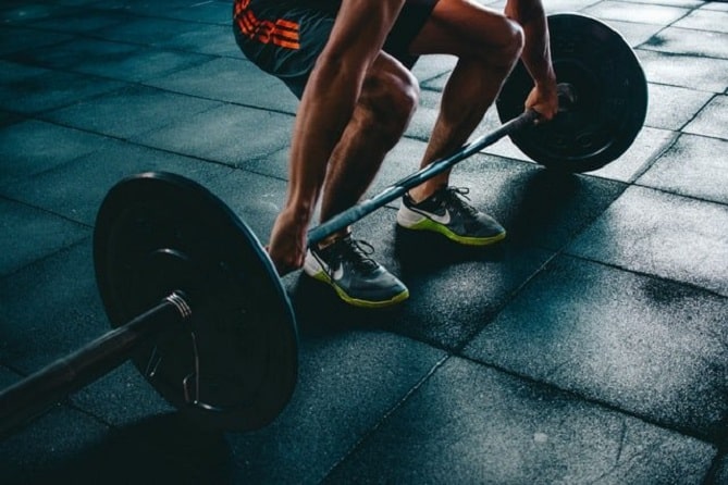 Man lifting a barbell