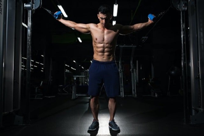 The man during training at the gym