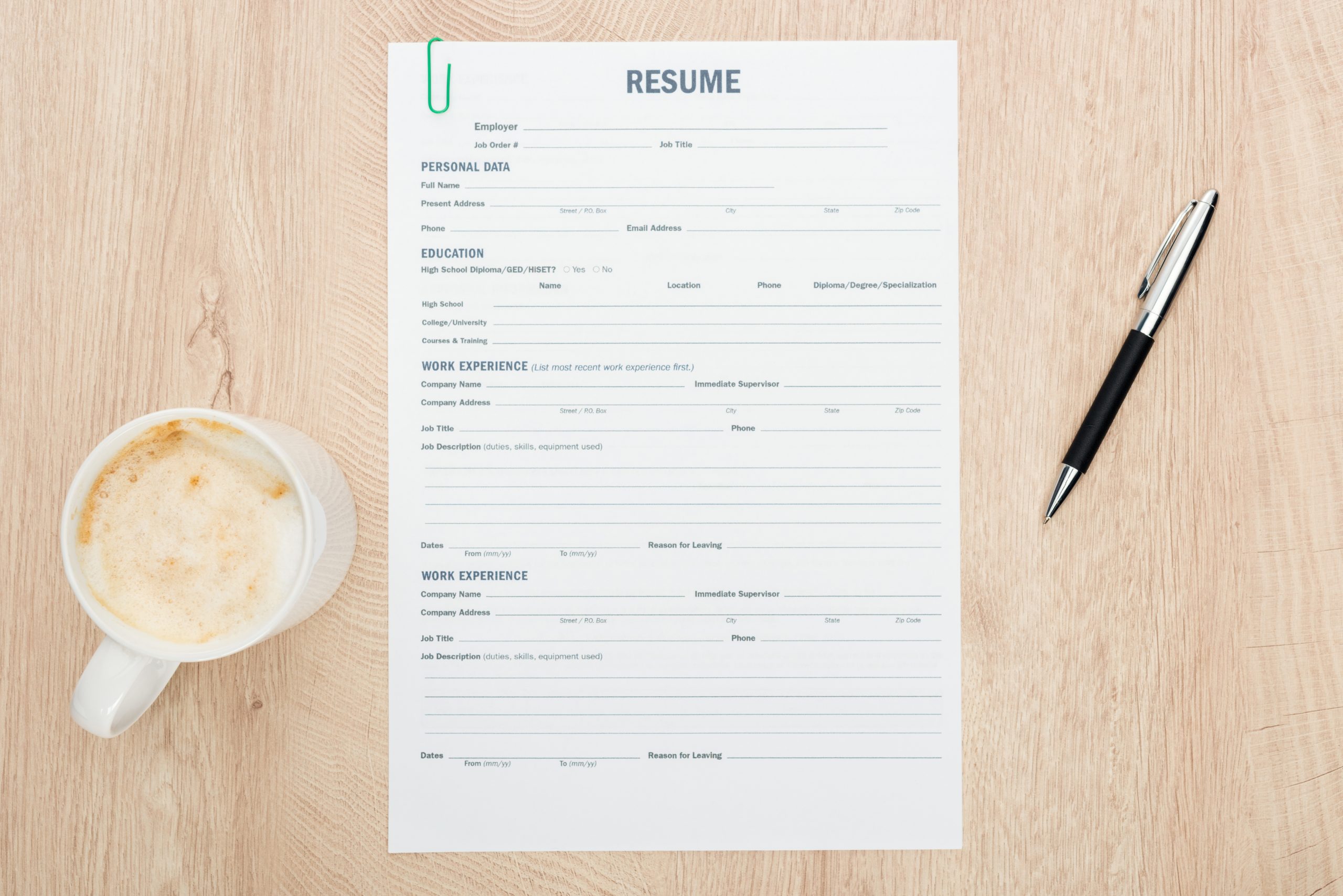 A top view of a resume for payroll specialist job application