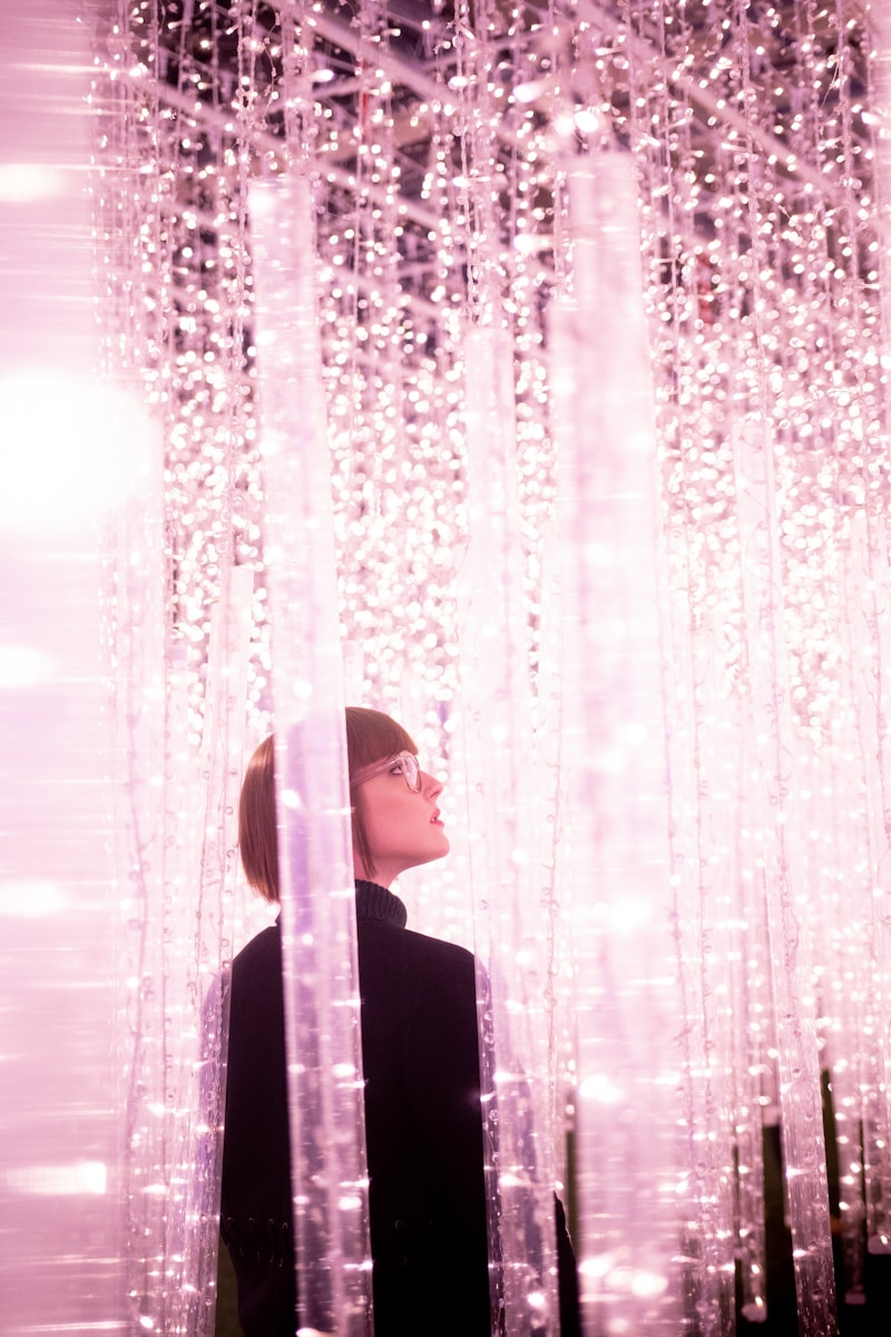 woman walking in between light