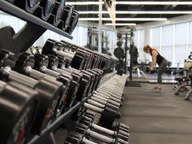 Equipment at the gym and a woman