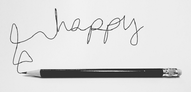 Escrito a mão feliz e um lápis